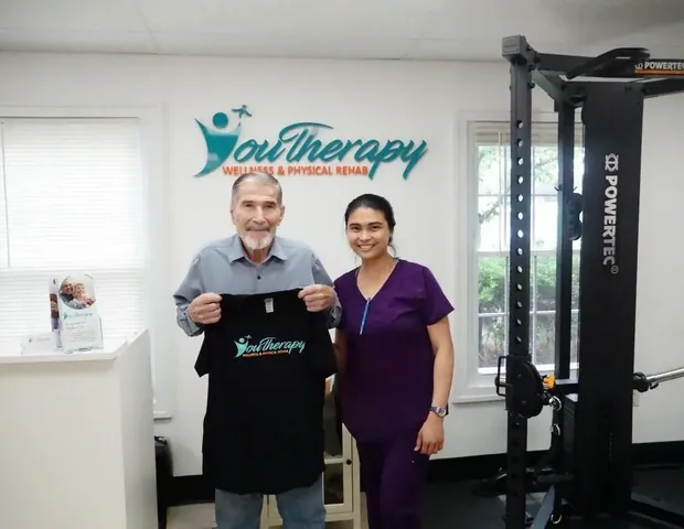 Licensed physical therapist reviewing a treatment plan with a patient